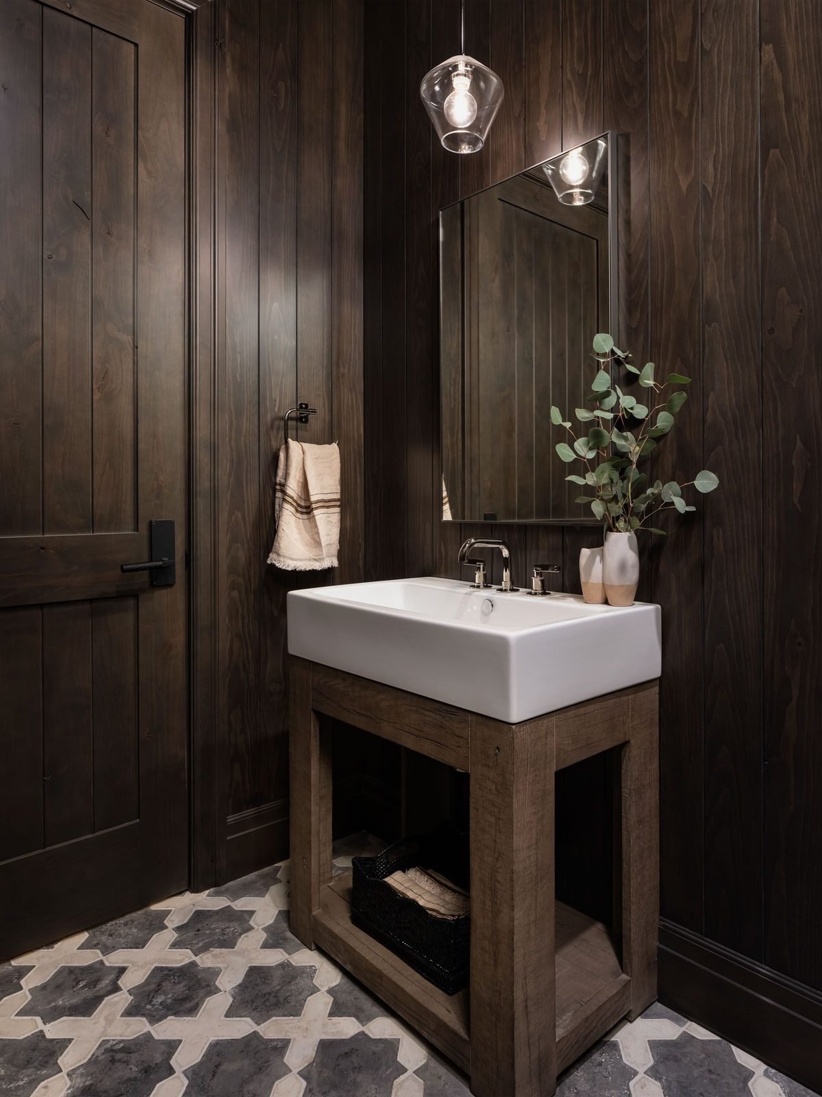 Powder bath with dark floating vanity