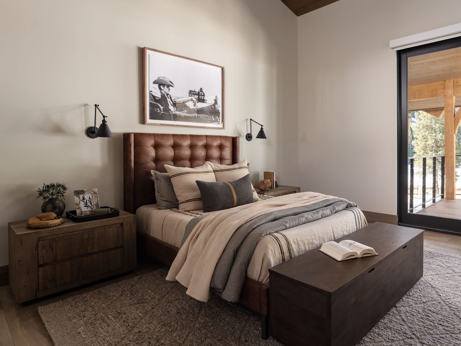 Primary bedroom with large windows